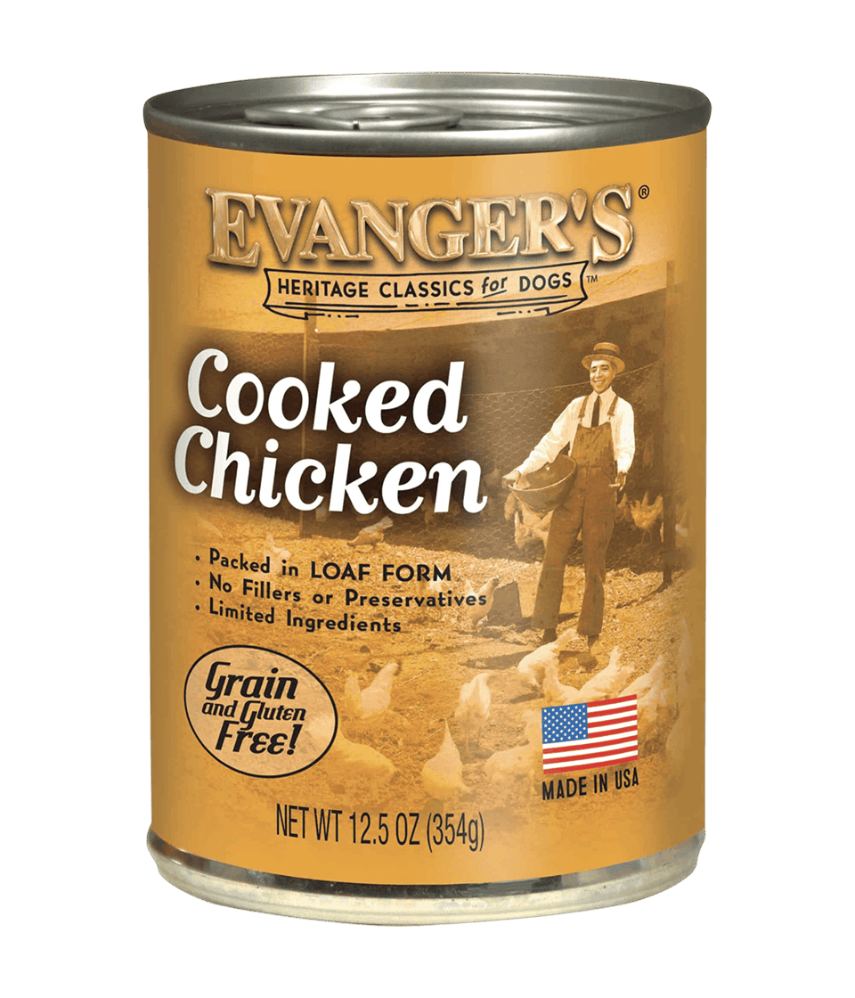 Case of 12 Heritage Classic Cooked Chicken dog food cans; grain and gluten free, loaf style, made in the USA, with label featuring a man and dogs in the background.