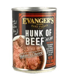 A 12 oz can of Evanger's Hunk of Beef - packed by hand! for dogs, featuring beef chunks in juice and labeled "Yukon's Choice.