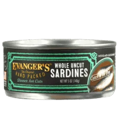 A 5 oz can of Hand Packed Catch of the Day - Whole Sardines for Cats, case of 24, with sardine images and product info on the label.