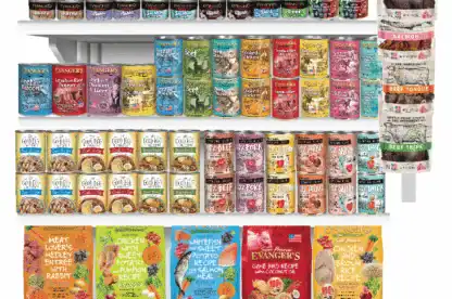 Retail display of Evanger’s pet food products, including canned food, dry food bags, and treats, arranged on shelves with a 90-year anniversary sign at the top.